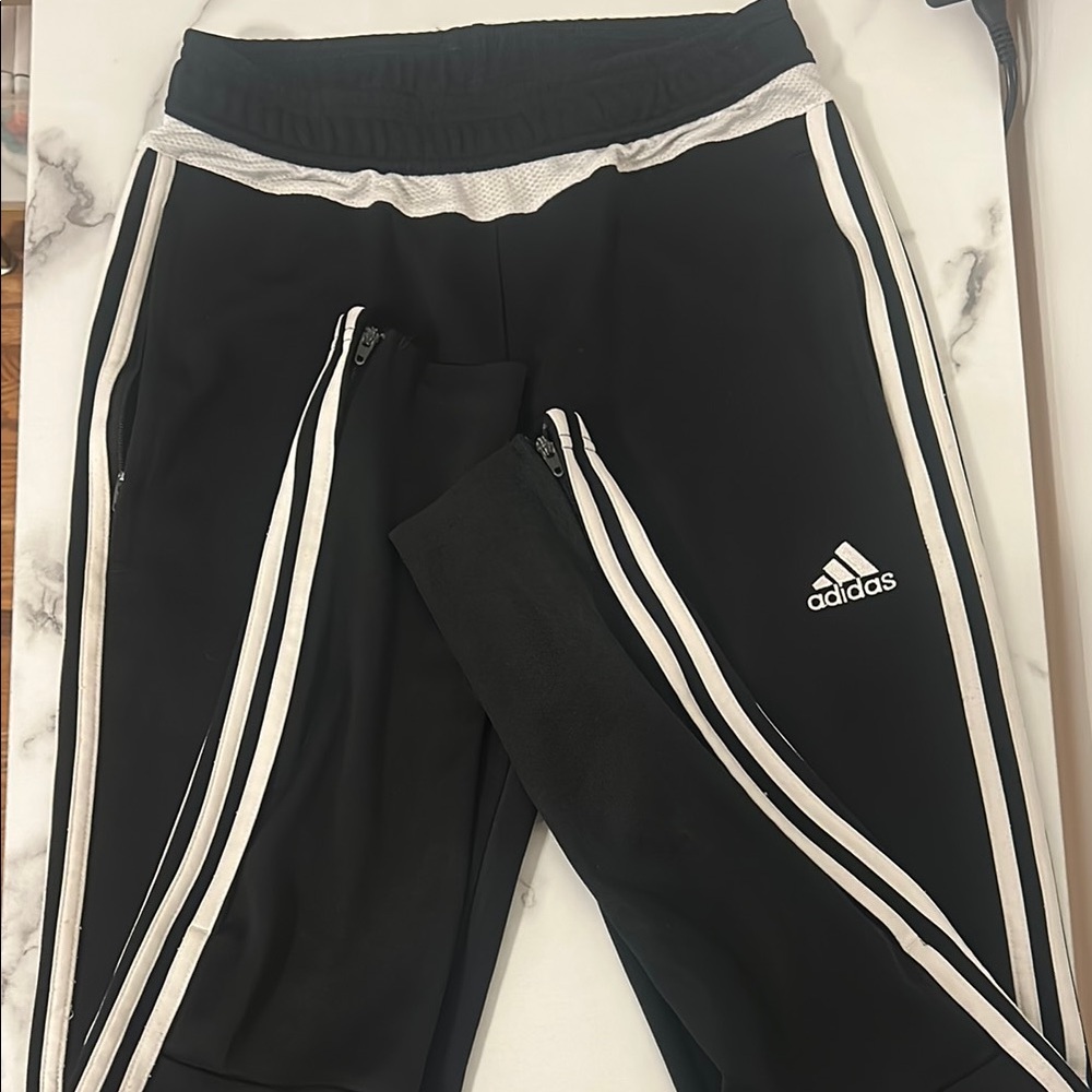 Adidas Black and White Track Pants with Iconic Stripes